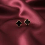 Gold plated black clover stud tops for women in Pakistan