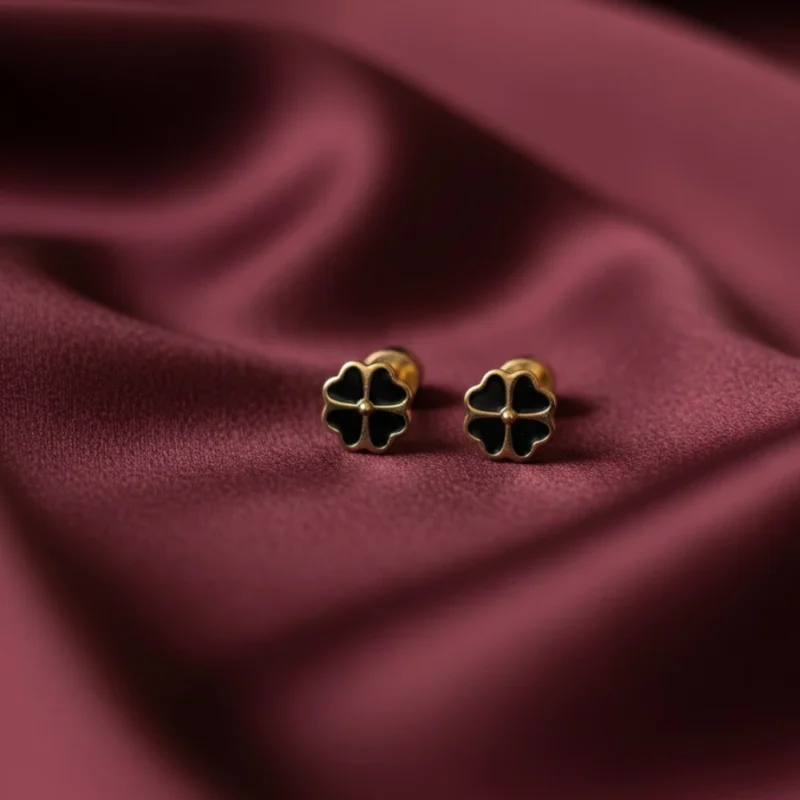Gold plated black clover stud tops for women in Pakistan