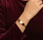 Gold plated clover floral bangle for women in Pakistan